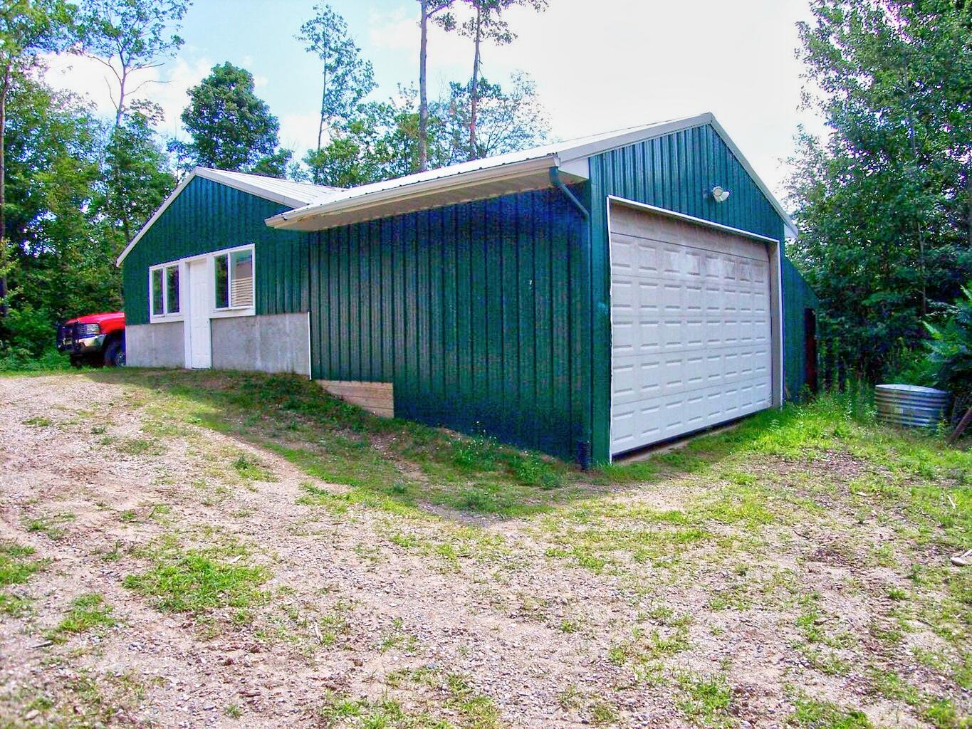 5917 Gamble Road Atlanta, MI 49709 - Photo 41 of 59 Barn and Storage with Outdoor Wood Burne