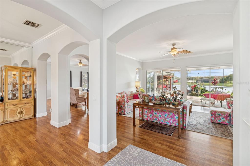 801 Glendora Road Kissimmee, FL 34759 - Photo 11 of 74 a living room with furniture and a wooden floor
