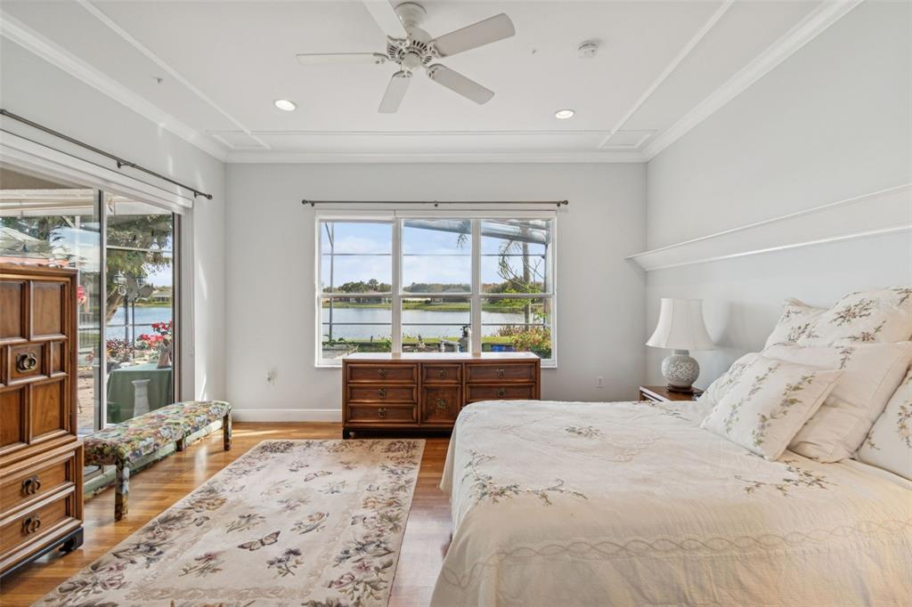 801 Glendora Road Kissimmee, FL 34759 - Photo 29 of 74 a bedroom with a large bed and a large window