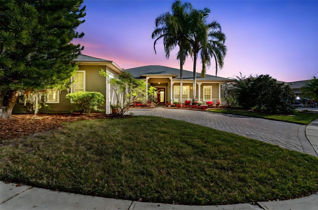 801 Glendora Road Kissimmee, FL 34759 - Photo 4 of 74 a front view of a house with a yard