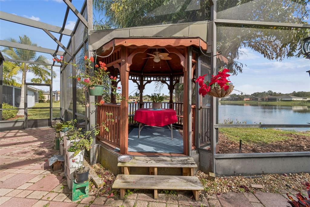 801 Glendora Road Kissimmee, FL 34759 - Photo 48 of 74 a view of balcony with two chairs and a table