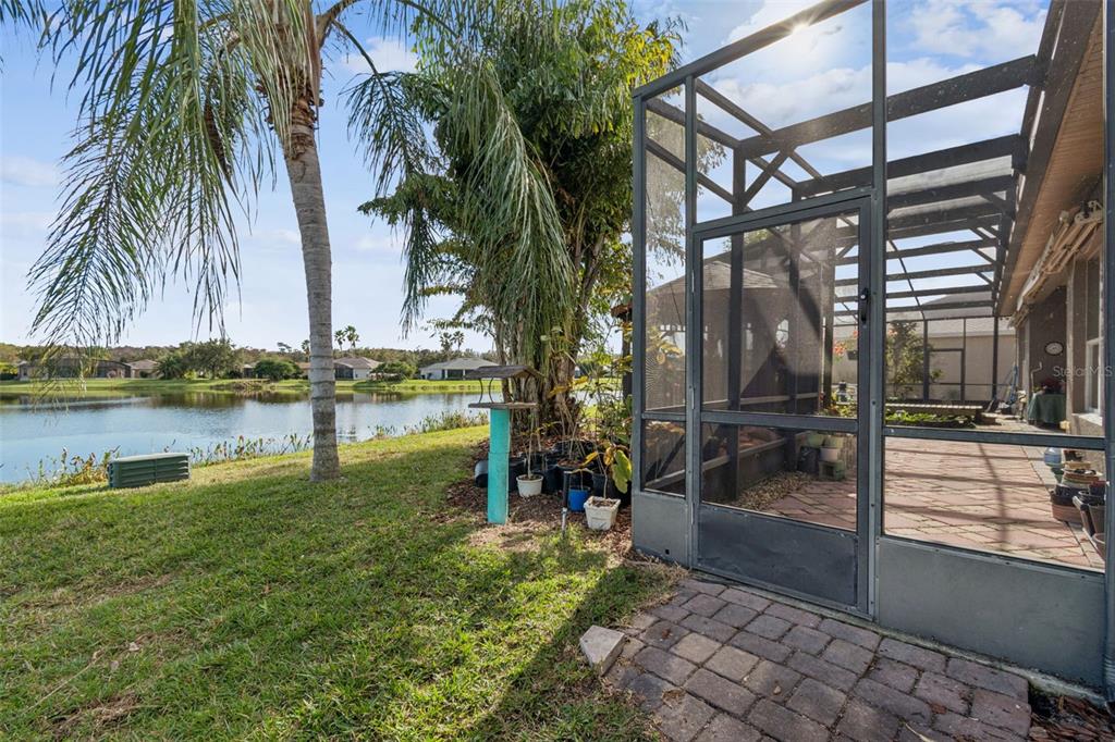 801 Glendora Road Kissimmee, FL 34759 - Photo 56 of 74 a swimming pool with outdoor seating and yard
