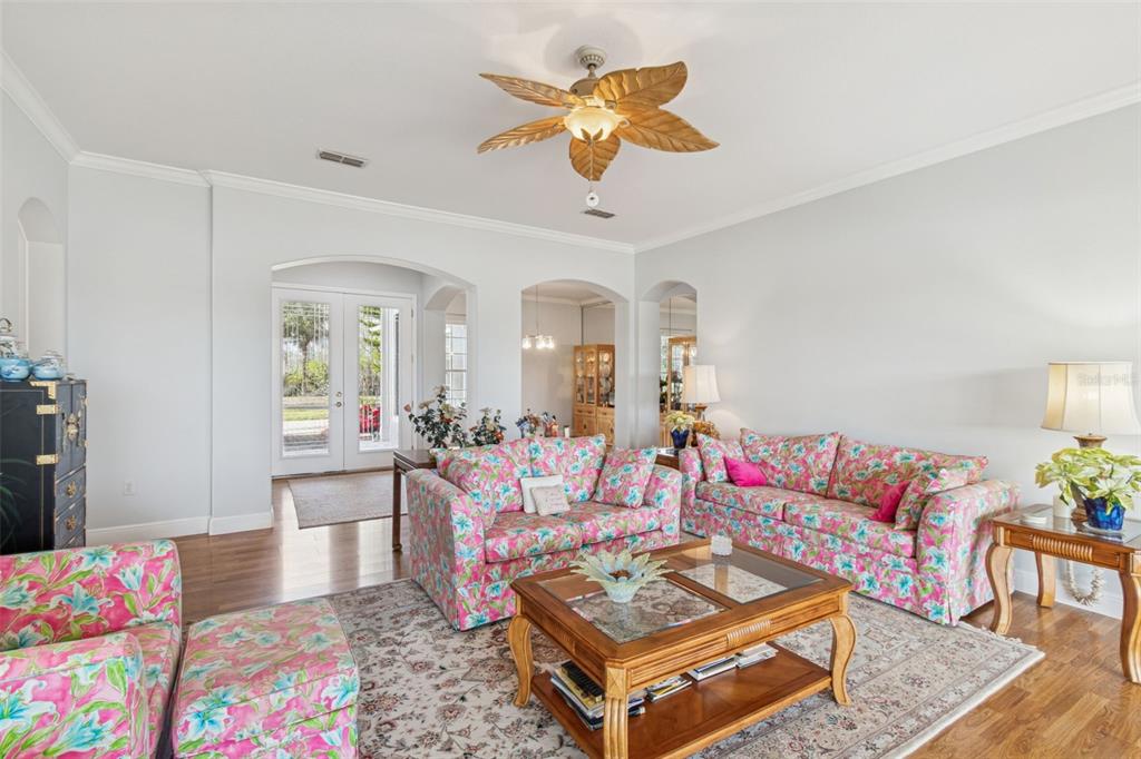 801 Glendora Road Kissimmee, FL 34759 - Photo 10 of 74 a living room with furniture and a rug