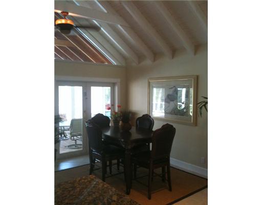 4331 Northeast Joes Point Road Jensen Beach, FL 34957 - Photo 3 of 8 a dining room with furniture and window