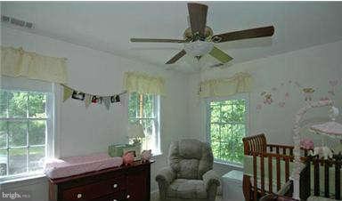 205 Captain Brendt Drive Accokeek, MD 20607 - Photo 13 of 28 a living room with furniture and a window