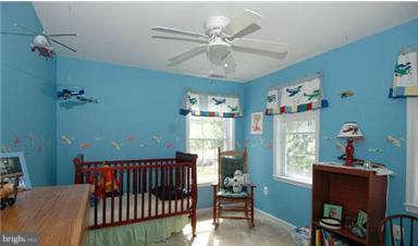 205 Captain Brendt Drive Accokeek, MD 20607 - Photo 15 of 28 a balcony with furniture and window