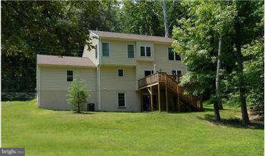 205 Captain Brendt Drive Accokeek, MD 20607 - Photo 3 of 28 front view of a house with a yard