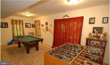 205 Captain Brendt Drive Accokeek, MD 20607 - Photo 23 of 28 a living room with furniture