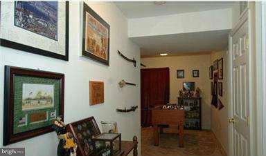 205 Captain Brendt Drive Accokeek, MD 20607 - Photo 24 of 28 a view of a hallway with furniture and entryway