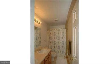 205 Captain Brendt Drive Accokeek, MD 20607 - Photo 25 of 28 a bathroom with a bathtub and shower