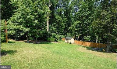 205 Captain Brendt Drive Accokeek, MD 20607 - Photo 5 of 28 a view of backyard with swimming pool