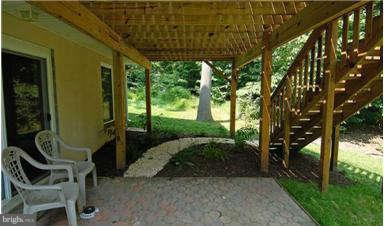 205 Captain Brendt Drive Accokeek, MD 20607 - Photo 6 of 28 a view of two chairs in the patio