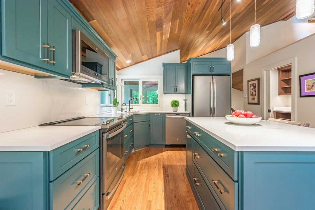 132 Littleton Road Harvard, MA 01451 - Photo 8 of 41 a kitchen with a sink stove and refrigerator