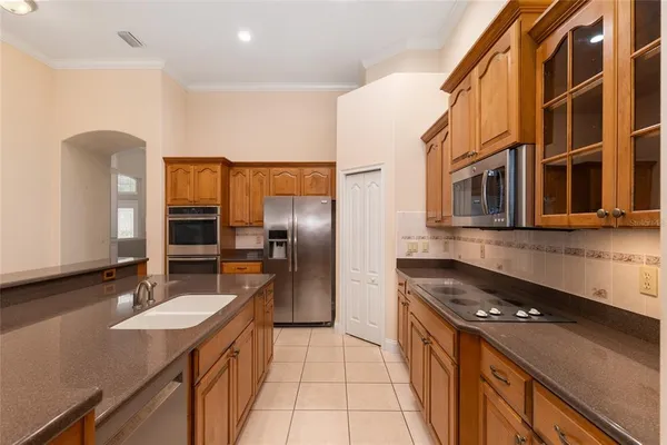 a view of a room with shelf on the wall