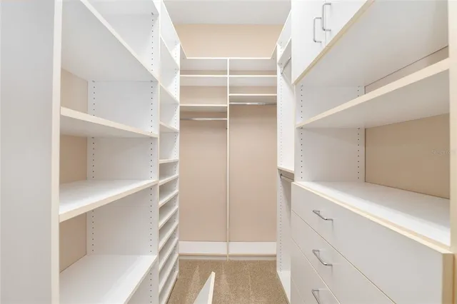 a front view of a house with a yard and porch