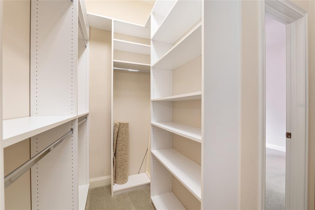 4815 Southeast 12th Place Ocala, FL 34471 - Photo 35 of 59 a view of walk in closet with empty racks