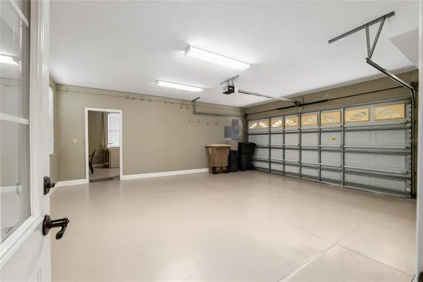 a view of a house with a tree in the background