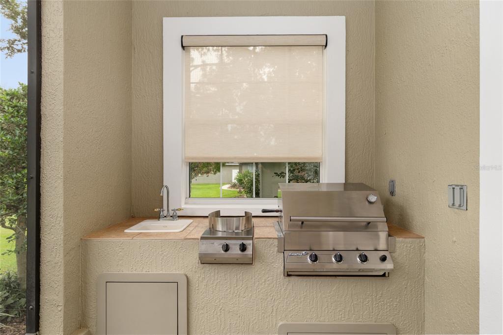 4815 Southeast 12th Place Ocala, FL 34471 - Photo 48 of 59 a room with a window a sink and a table