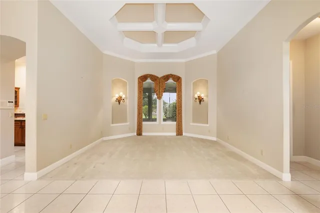 a view of a room with shelf on the wall