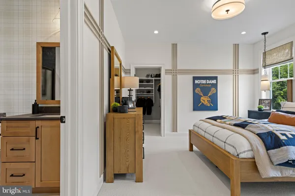 a bed room with a bed and a television