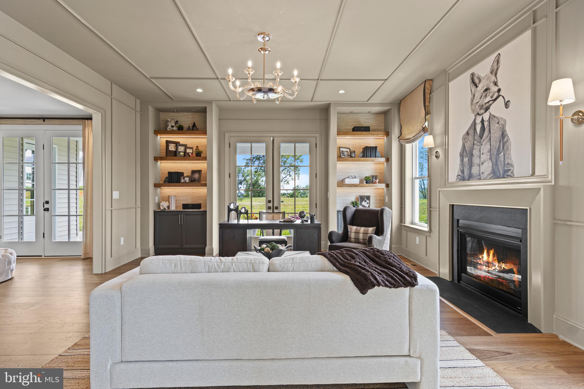 200 Concord Way, Unit MODEL Glenmoore, PA 19343 - Photo 7 of 48 a living room with furniture fireplace and chandelier