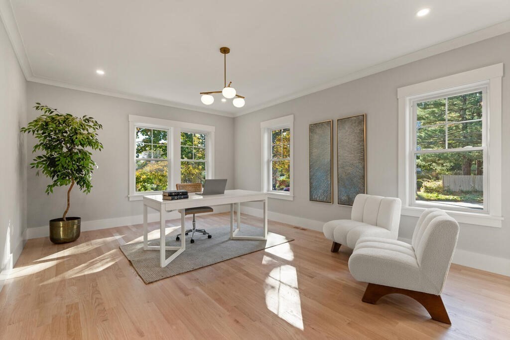 445 Lowell Street Lexington, MA 02420 - Photo 14 of 41 a living room with furniture and a large window