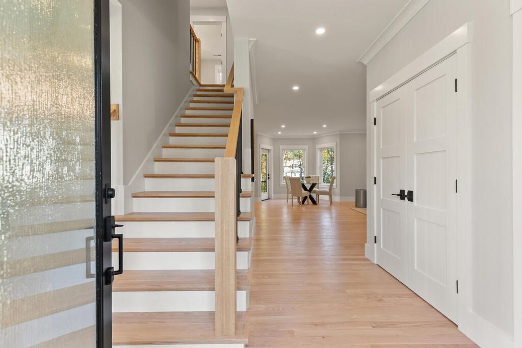 445 Lowell Street Lexington, MA 02420 - Photo 2 of 41 a view of entryway and hall with wooden floor