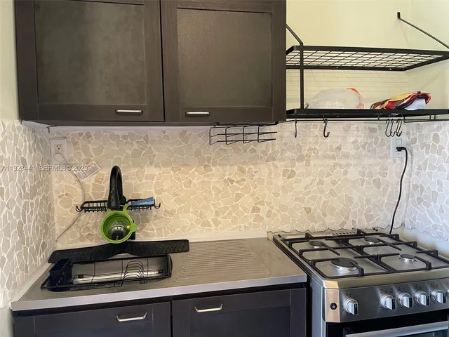 a view of a sink and wooden floor