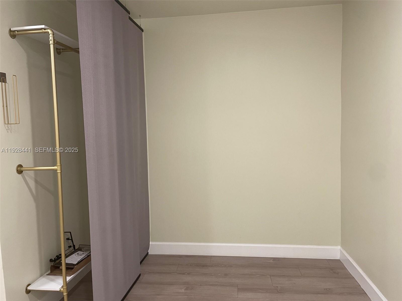 14121 Kendale Lakes Boulevard, Unit 14121 Miami, FL 33183 - Photo 6 of 9 a view of closet area