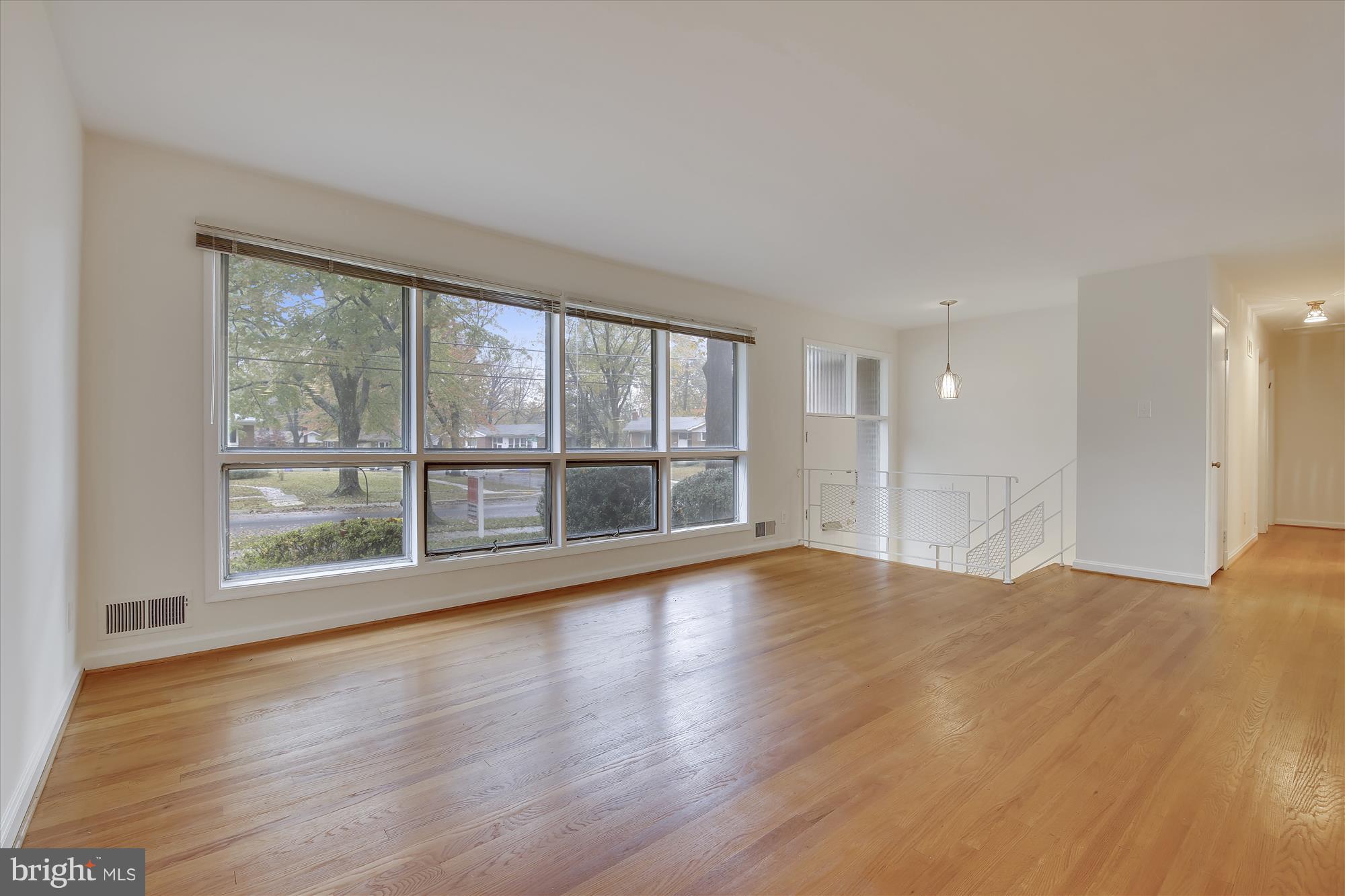 1900 Ladd Street Silver Spring, MD 20902 - Photo 5 of 36 Inviting Living Room with wall of Windows