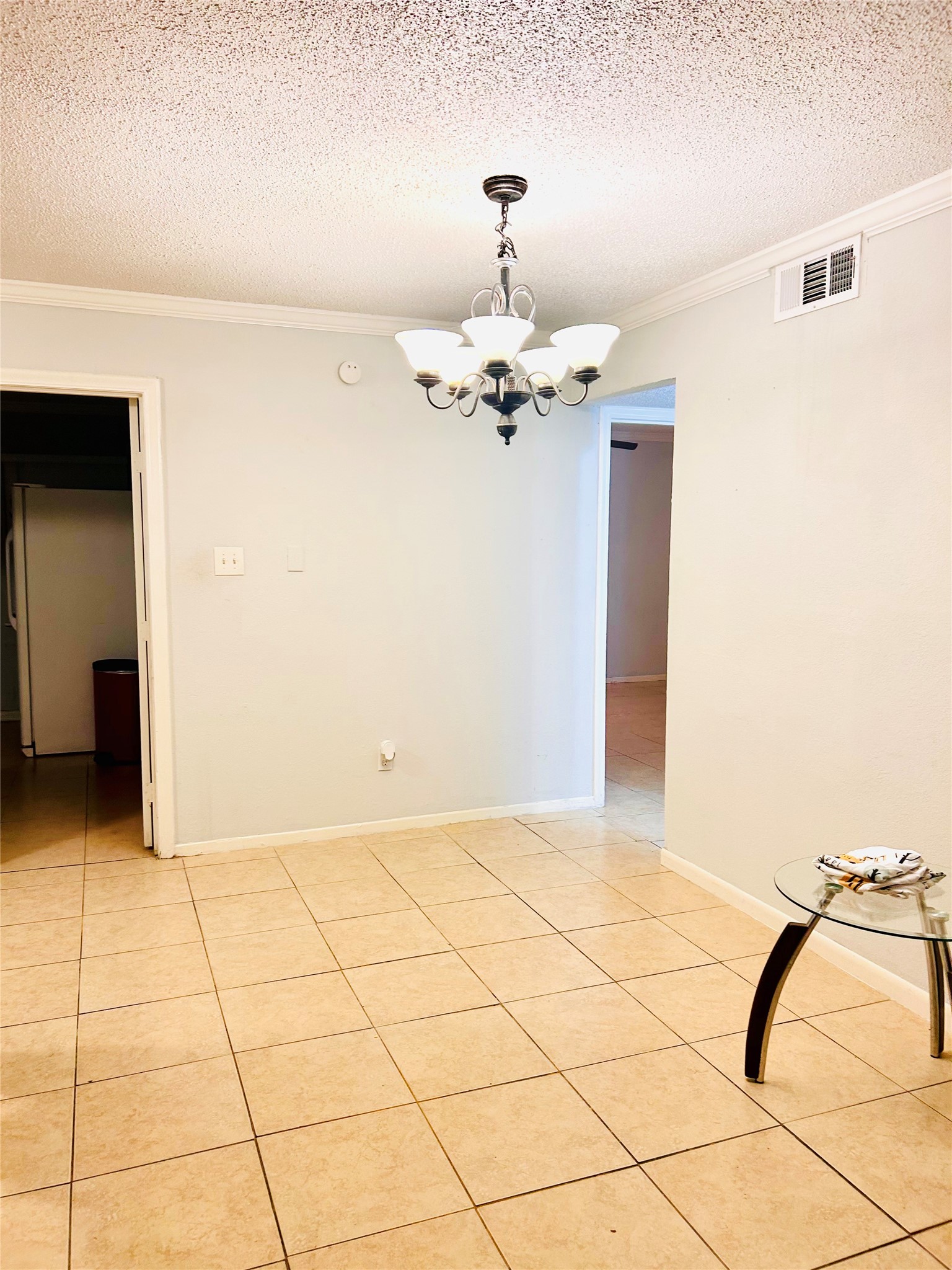 11643 Chimney Rock Road, Unit B Houston, TX 77035 - Photo 1 of 9 a view of a room with a chandelier
