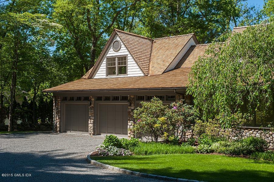 122 Clapboard Ridge Road Greenwich, CT 06830 - Photo 5 of 39 a view of a house with a yard and potted plants