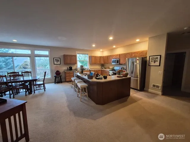 a bedroom with a bed and a view of bathroom