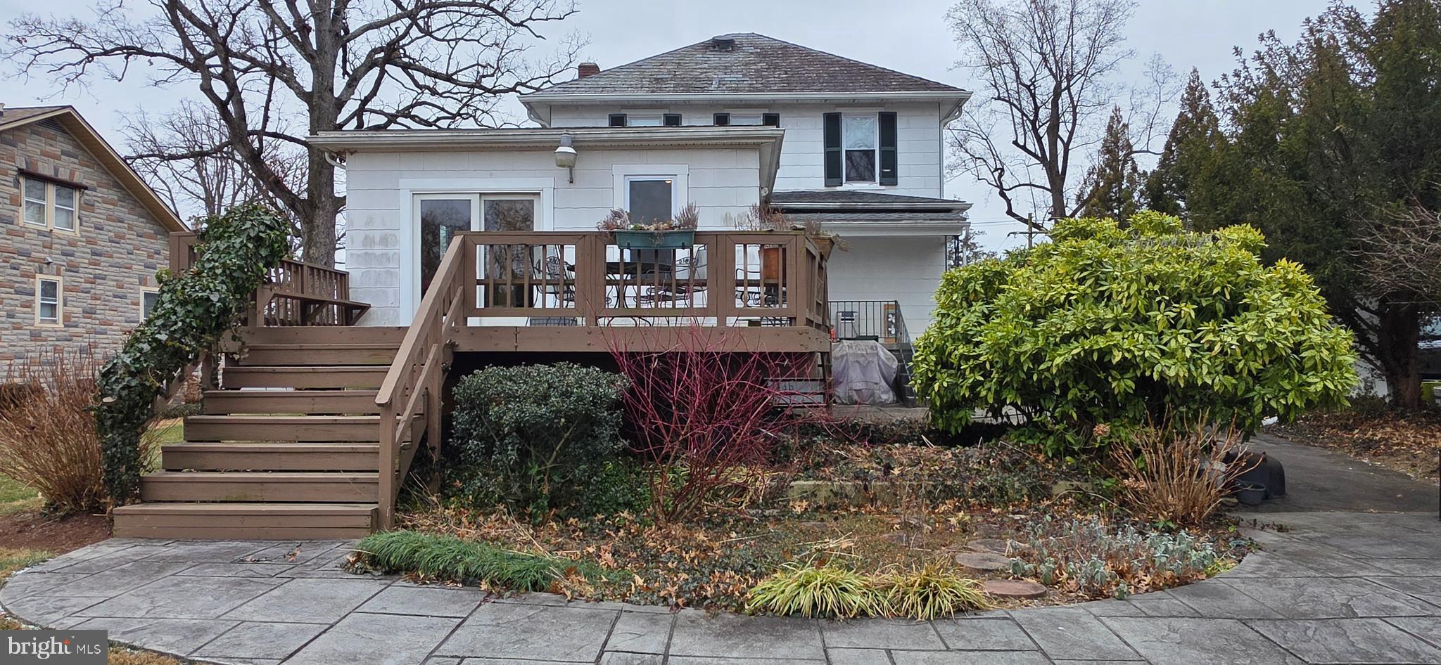1516 Ridge Road Baltimore, MD 21228 - Photo 4 of 30 Deck off the kitchen overlooking large, level yard