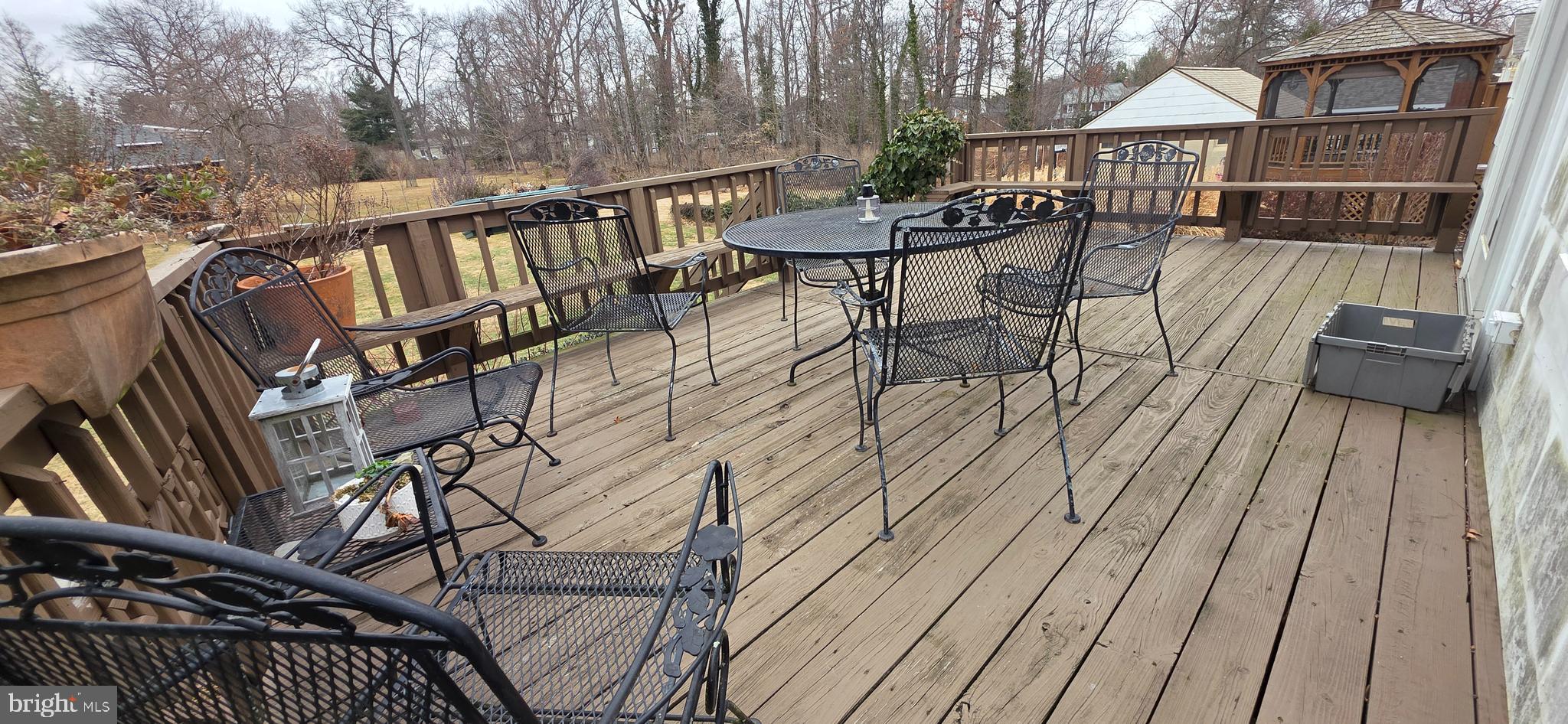 1516 Ridge Road Baltimore, MD 21228 - Photo 7 of 30 Deck off the kitchen overlooking large, level yard