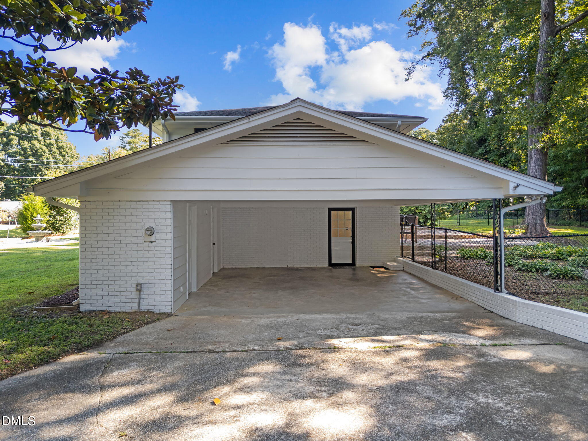 4901 Comelia Drive Raleigh, NC 27603 - Photo 36 of 55 Carport with additional storage