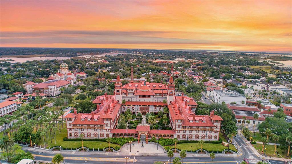 99 Blue Hvn Road St. Augustine, FL 32095 - Photo 34 of 45 an aerial view of a city with lots of residential buildings ocean and mountain view in back