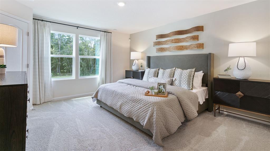 99 Blue Hvn Road St. Augustine, FL 32095 - Photo 9 of 45 a bedroom with a bed and a window