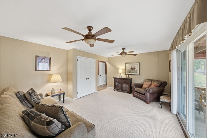 5 Glen Gate Road Boonton, NJ 07005 - Photo 11 of 46 a living room with furniture and a ceiling fan