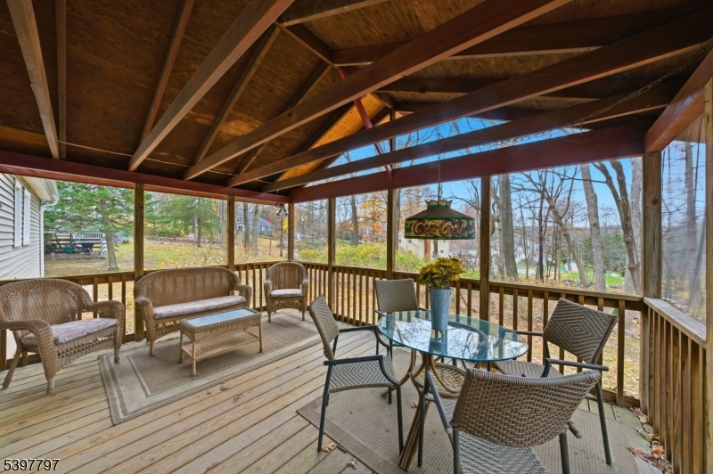 5 Glen Gate Road Boonton, NJ 07005 - Photo 37 of 46 a view of a balcony with chairs and wooden floor
