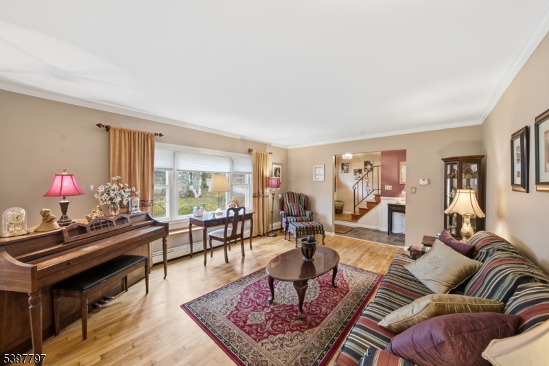 5 Glen Gate Road Boonton, NJ 07005 - Photo 8 of 46 a living room with furniture and a wooden floor