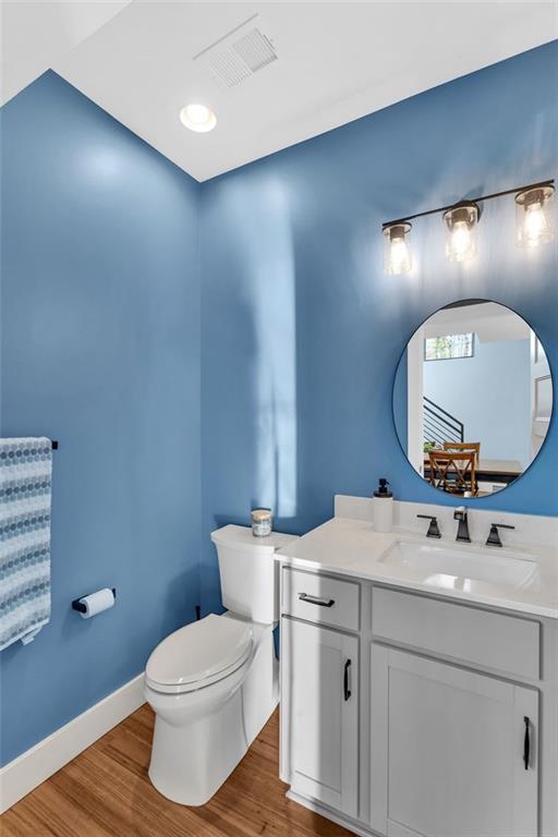6742 Old Mars Crider Road Cranberry Township, PA 16066 - Photo 40 of 50 a bathroom with a toilet a sink and mirror
