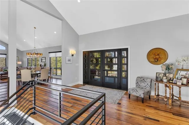 a room with wooden floor and window