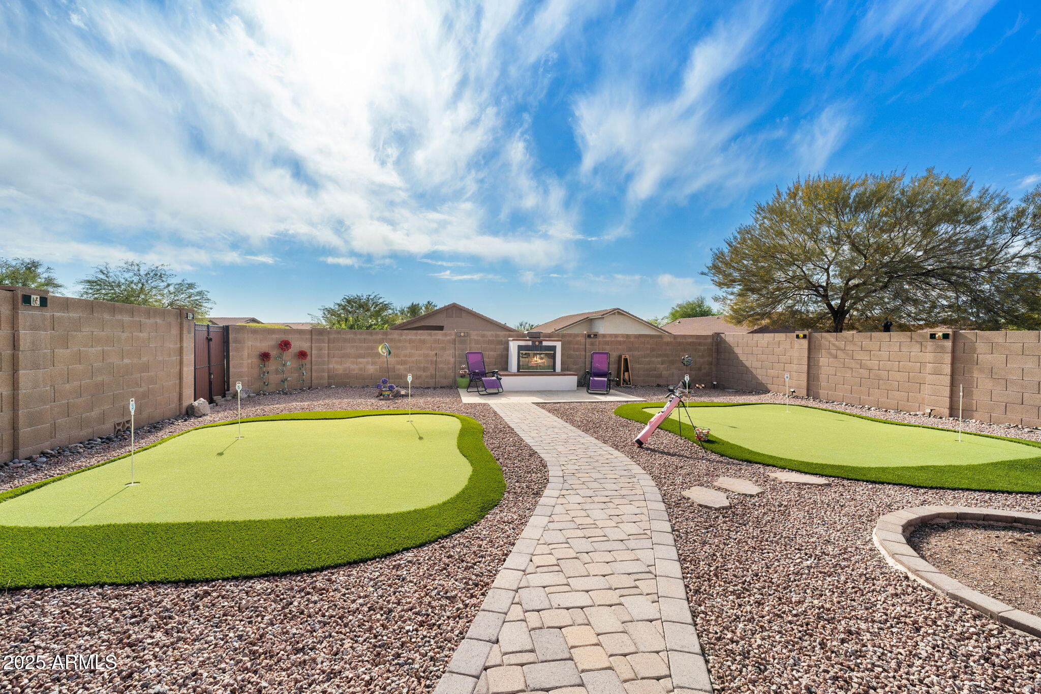 10363 East Rising Sun Place Gold Canyon, AZ 85118 - Photo 16 of 23 a view of a swimming pool with a chairs