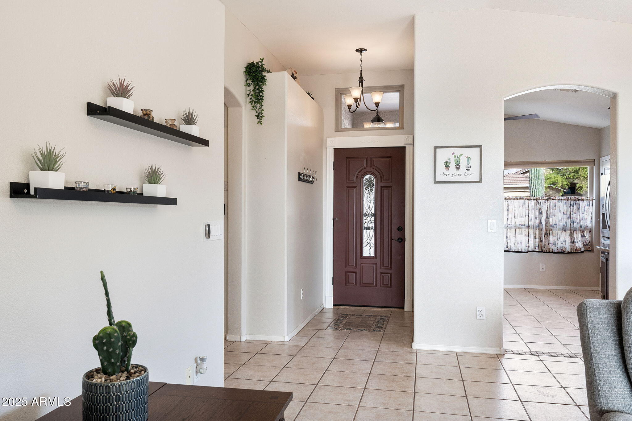 10363 East Rising Sun Place Gold Canyon, AZ 85118 - Photo 2 of 23 a view of an entryway with wooden floor