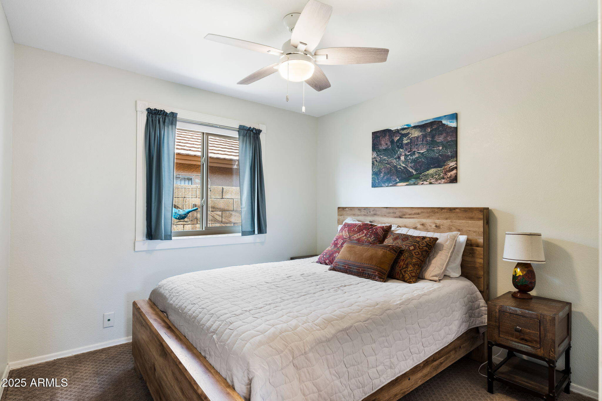 10363 East Rising Sun Place Gold Canyon, AZ 85118 - Photo 23 of 23 a bedroom with a large bed and a window