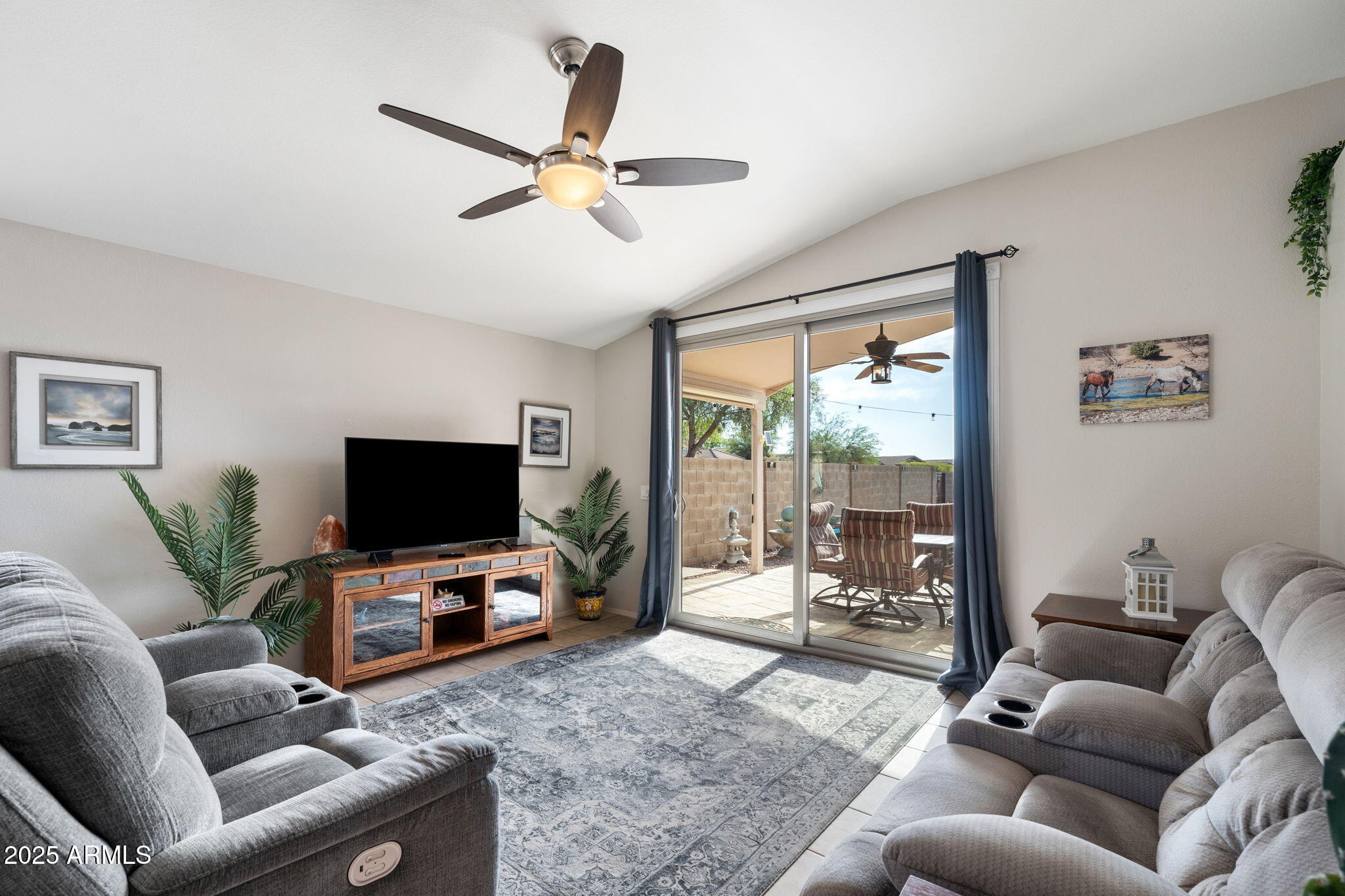 10363 East Rising Sun Place Gold Canyon, AZ 85118 - Photo 4 of 23 a living room with furniture and a flat screen tv