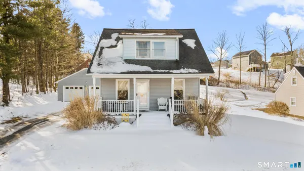 a front view of a house with patio