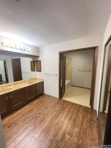 a view of a kitchen with a sink