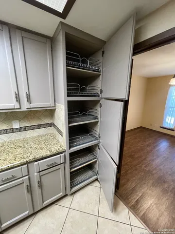 a view of storage and utility room